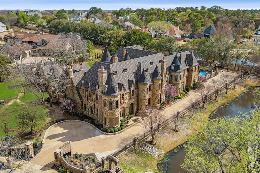 A seven-bedroom, 12-bathroom private castle at 1161 La Mirada Court in Southlake is on the...
