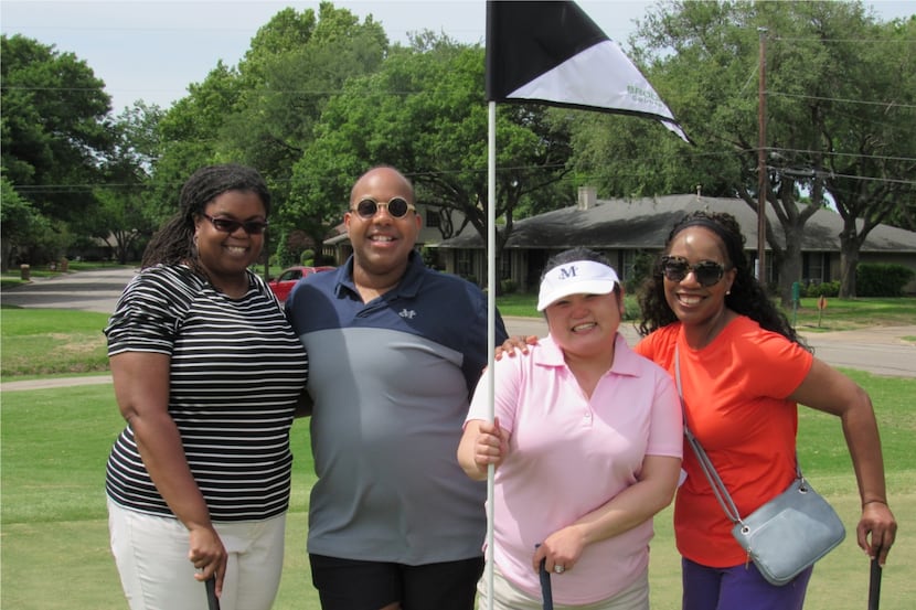 Merit Energy employees enjoyed a day at the golf course during Merit's annual golf and...