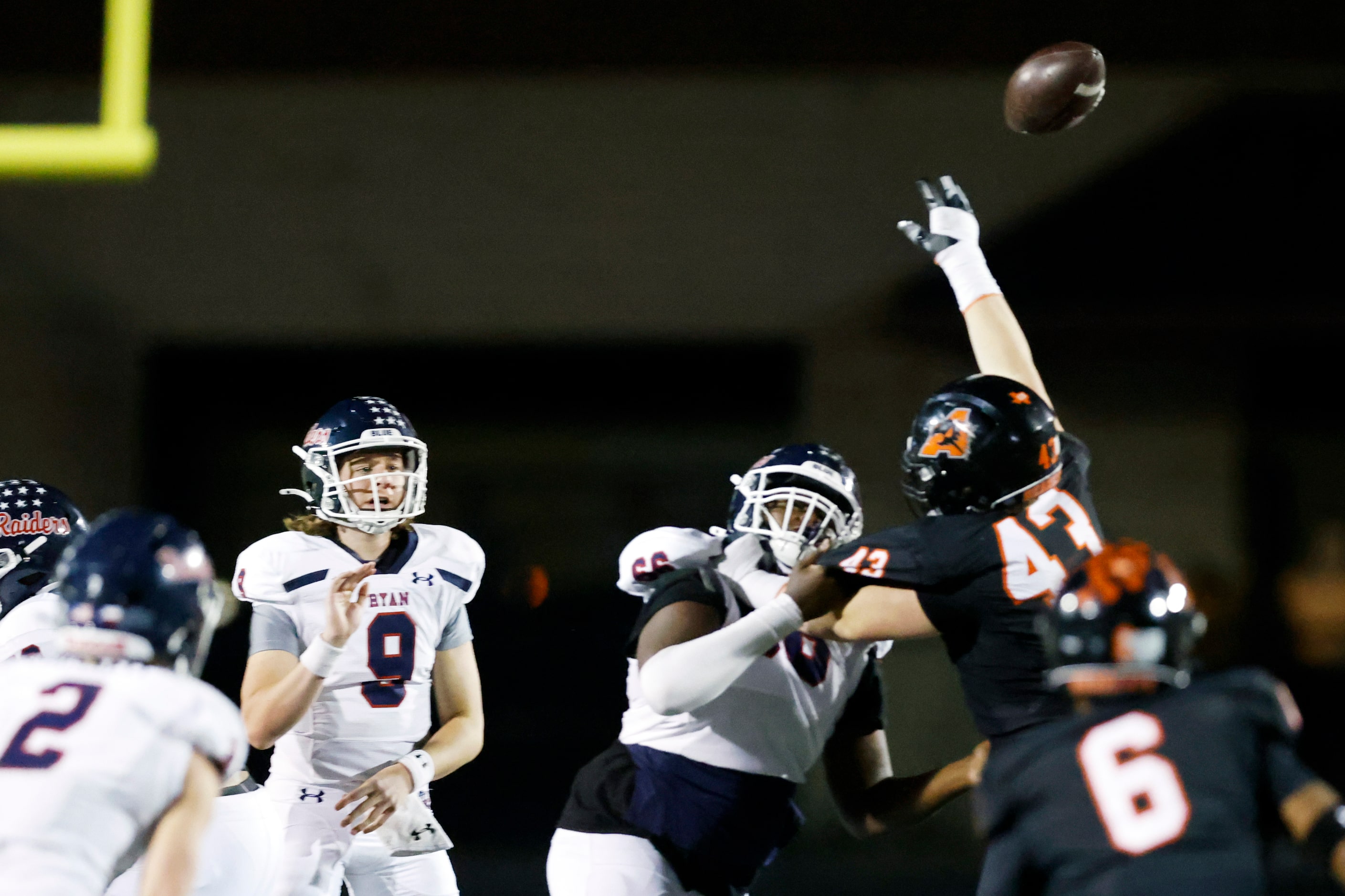 Aledo defensive lineman Jaxon Richter (43) deflects a pass from Denton Ryan quarterback Quin...