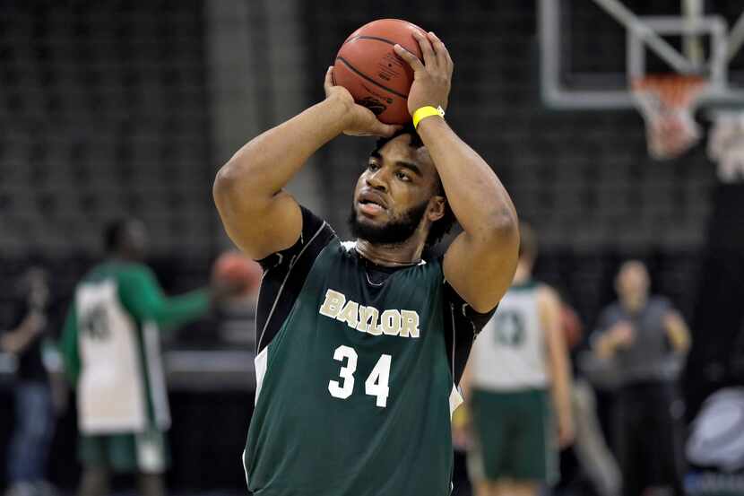 Baylor forward Rico Gathers shoots during practice at the NCAA college basketball...