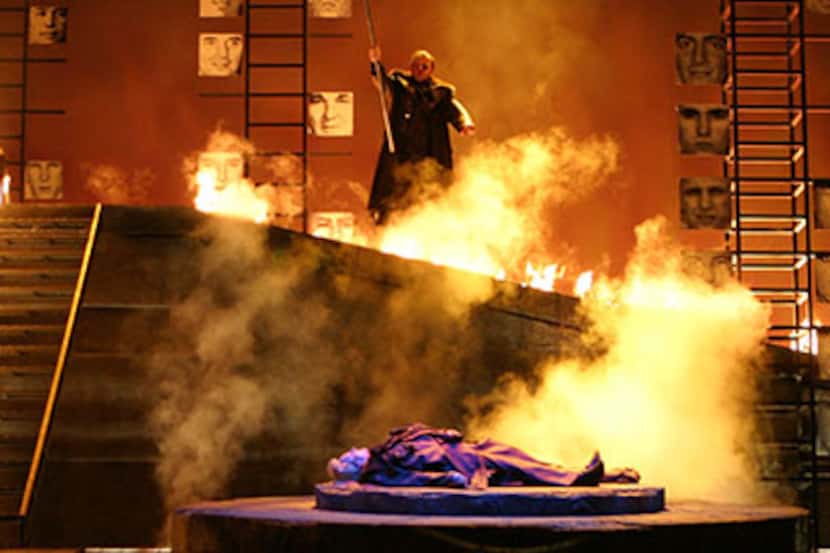  Wotan looms over the fire-guarded BrÃ¼nnhilde in Washington National Opera's "The Valkyrie."