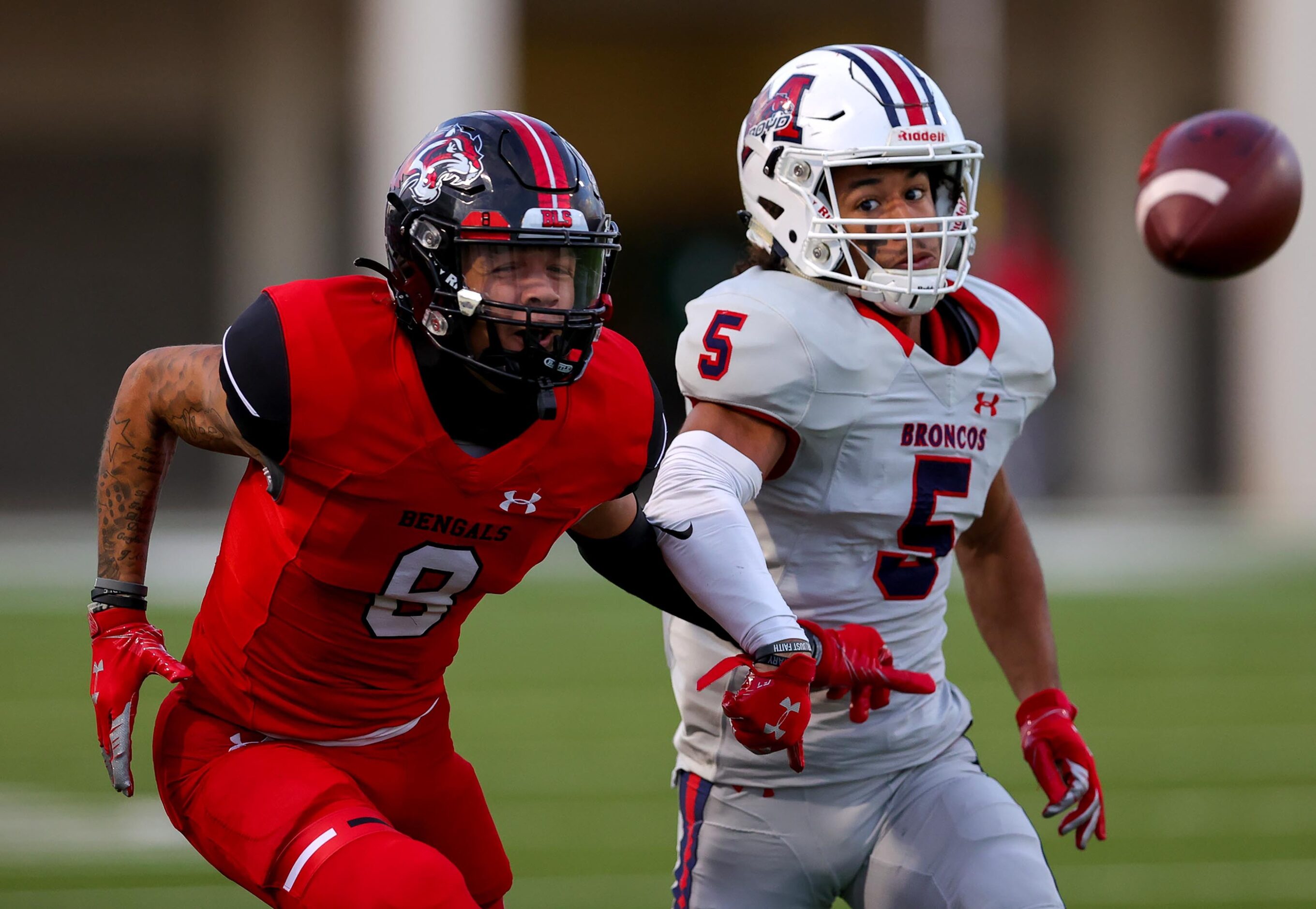 Denton Braswell wide receiver Jaeden Acker (8) is defended by McKinney Boyd defensive back...