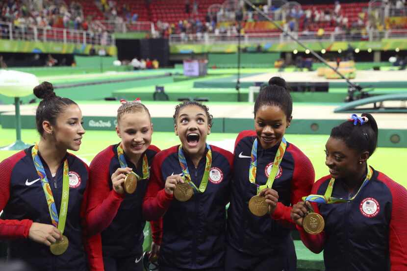 The United States women's team, from left: Aly Raisman, Madison Kocian, Laurie Hernandez,...