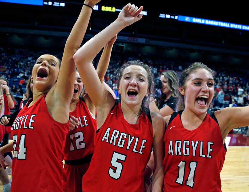 Argyle's Abby Williams,Argyle's Rhyle McKinney,C, and Argyle's Brooklyn Carl begin their...