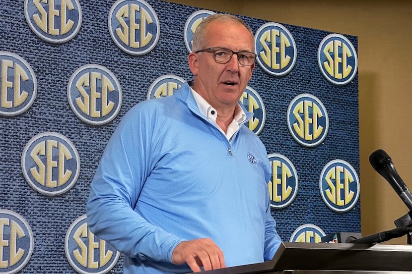 Southeastern Conference Commissioner Greg Sankey speaks to reporters during the conference's...