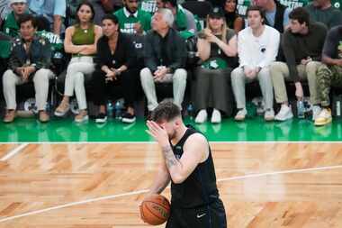 Dallas Mavericks guard Luka Doncic reacts after being fouled during the first half in Game 1...