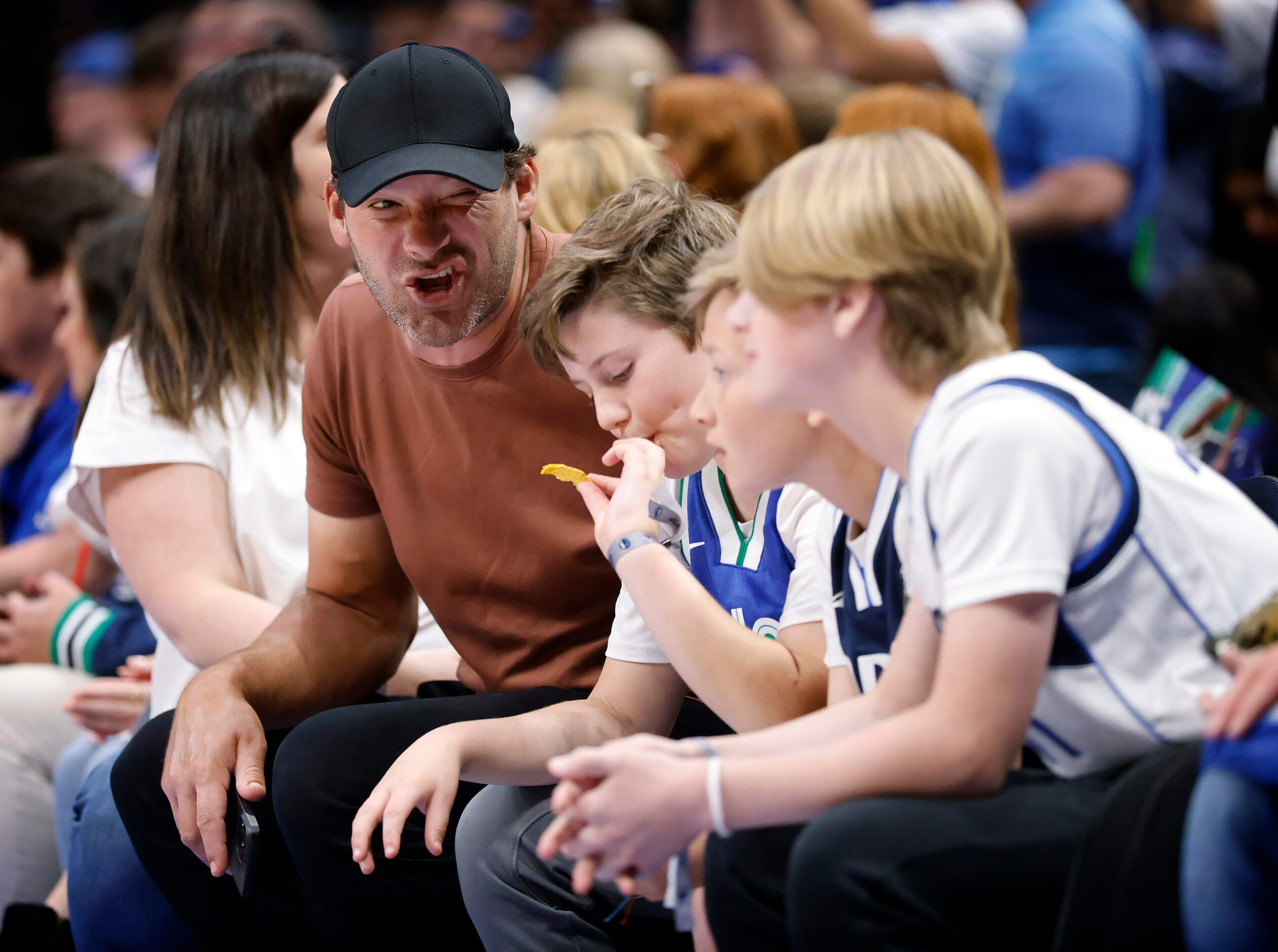 Former Dallas Cowboys quarterback Tony Romo was on the front row chatting up kids during the...