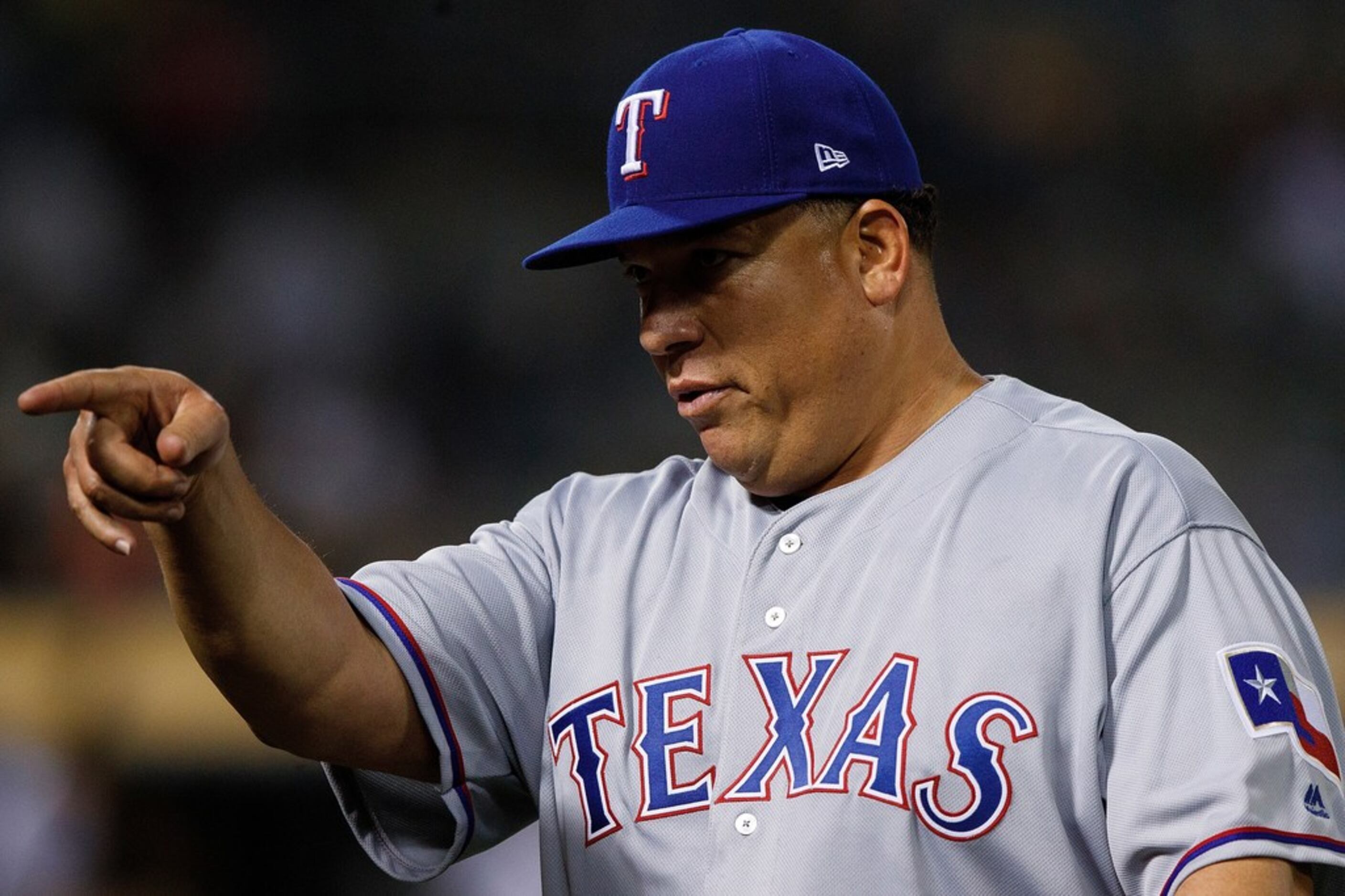 Adrian Beltre of the Texas Rangers throws out the runner on first News  Photo - Getty Images