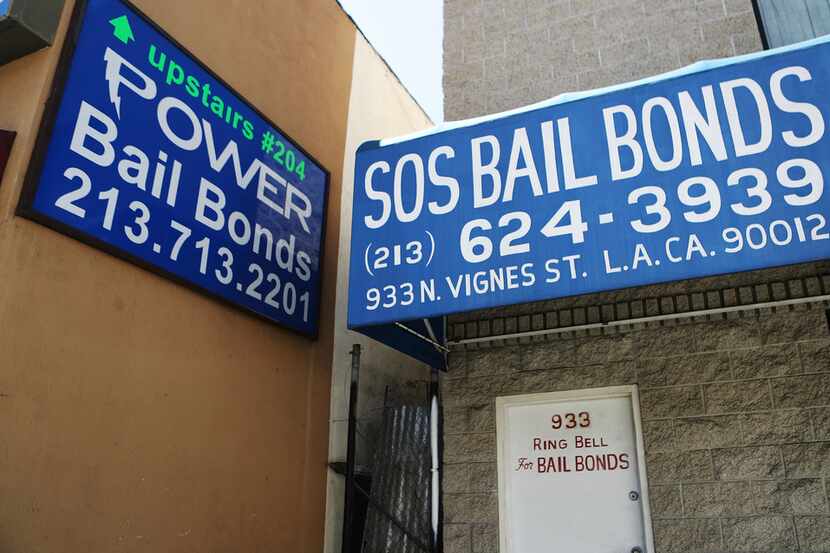 Signs advertise bail bond companies on August 29, 2018 in Los Angeles, California....