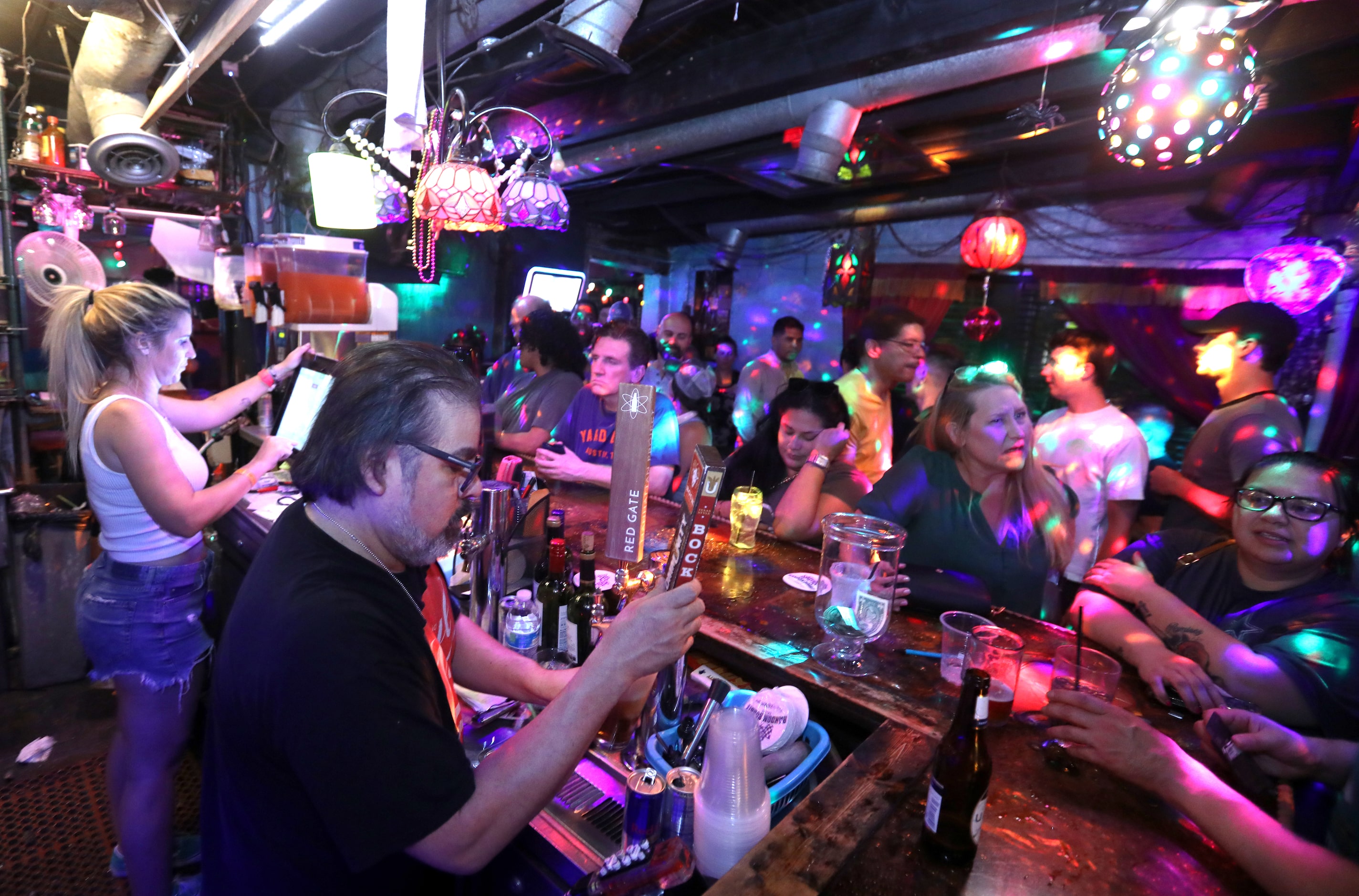 Guests enjoy one last evening at the Grapevine Bar in Dallas, TX, on Aug 23, 2023.  (Jason...