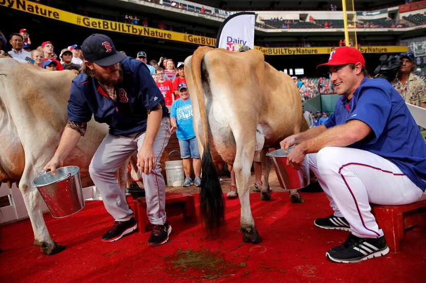 Boston Red Sox pitcher Wade Miley (left) came up a little short in the bucket asTexas...