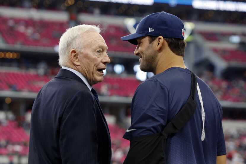 Oct 11, 2015; Arlington, TX, USA; Dallas Cowboys owner Jerry Jones talks to injured starting...