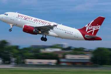  A Virgin America Airbus A319 lifts off from Dallas Love Field in this May photo. (Terry...