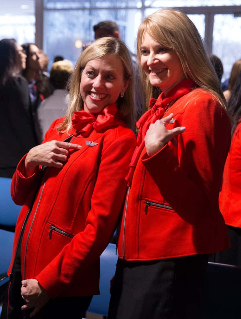 Southwest Airlines flight attendants Shari Rood (left) and Linda Clark pose for a photo...