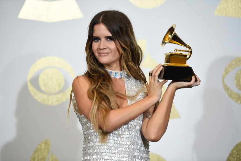 FILE - In this Feb. 12, 2017 file photo, Marin Morris poses in the press room with the award...