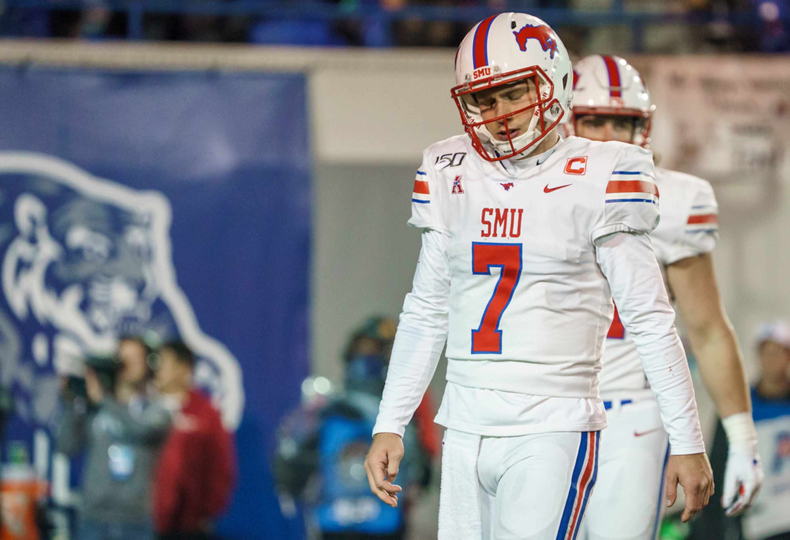 SMU quarterback Shane Buechele (7) reacts after throwing an incomplete pass during the...