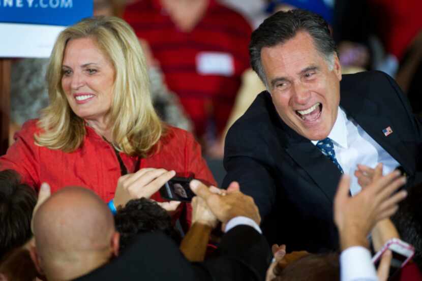 Florida Republican primary winner Mitt Romney and his wife, Ann, greeted the crowd gathered...