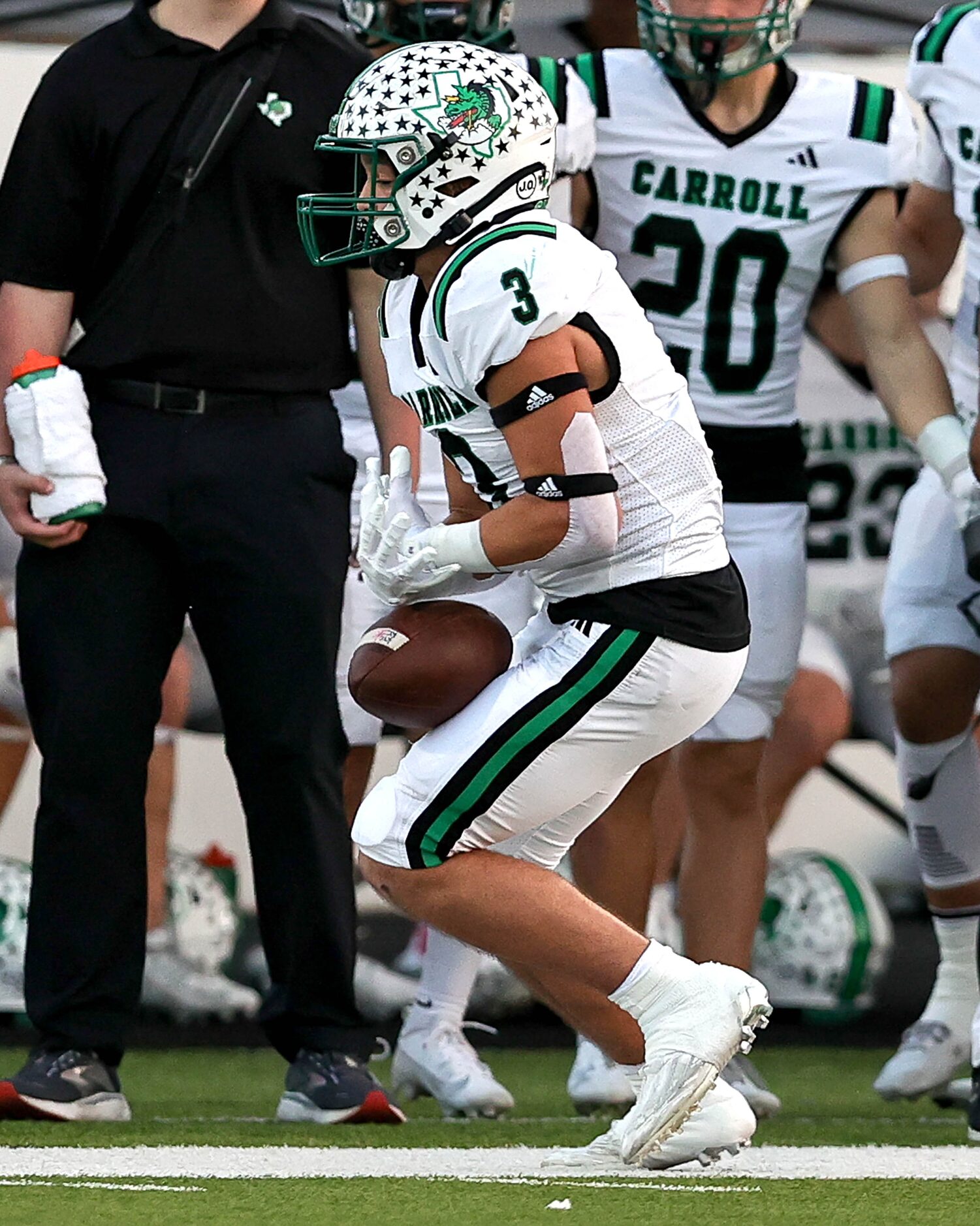 Southlake Carroll running back Davis Penn drops a pass against Byron Nelson during the first...