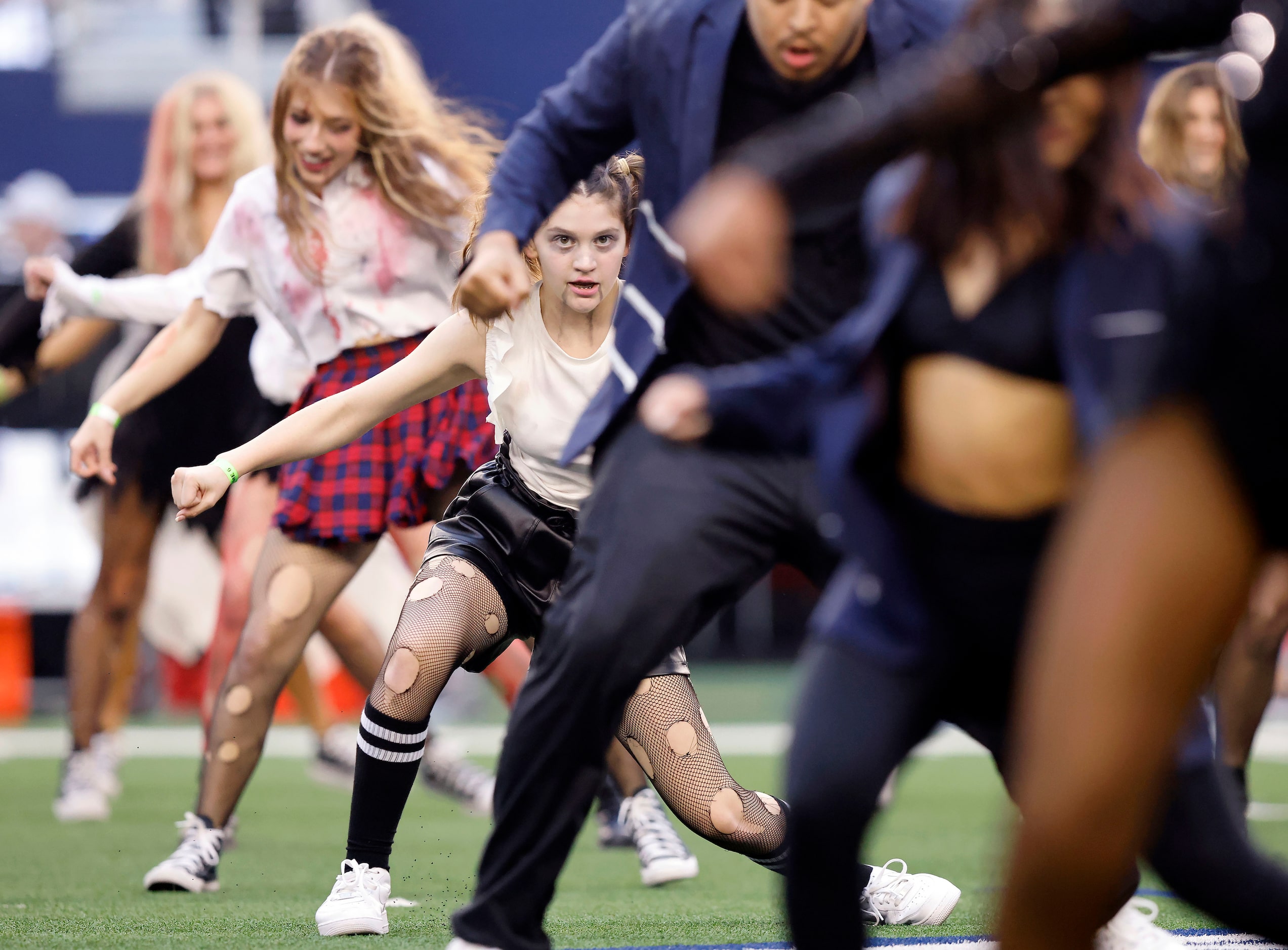 Members of the Southlake Carroll drill team joined the Dallas Cowboys Rhythm and Blue...