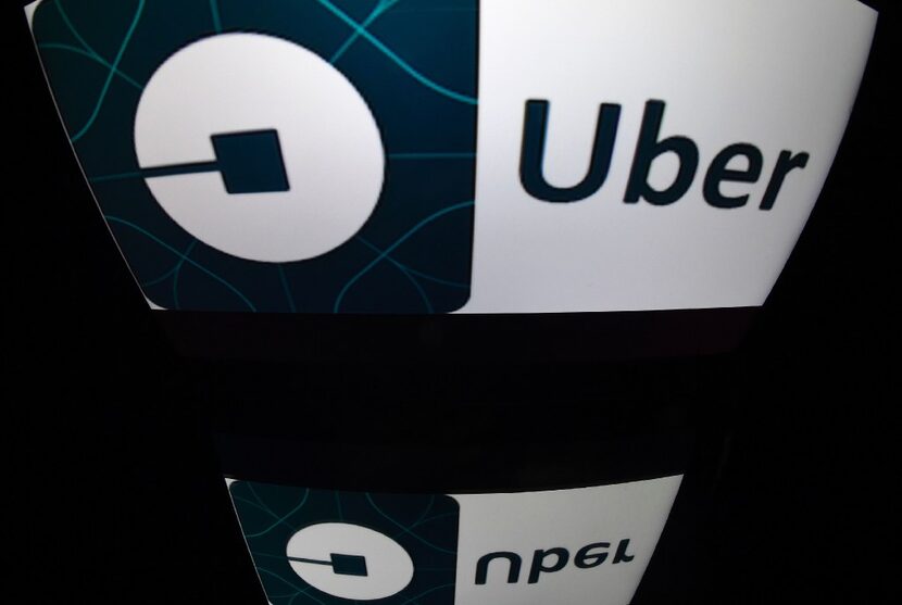 This file photo taken on December 28, 2016 shows shows the logo of Uber in Paris. 
German...