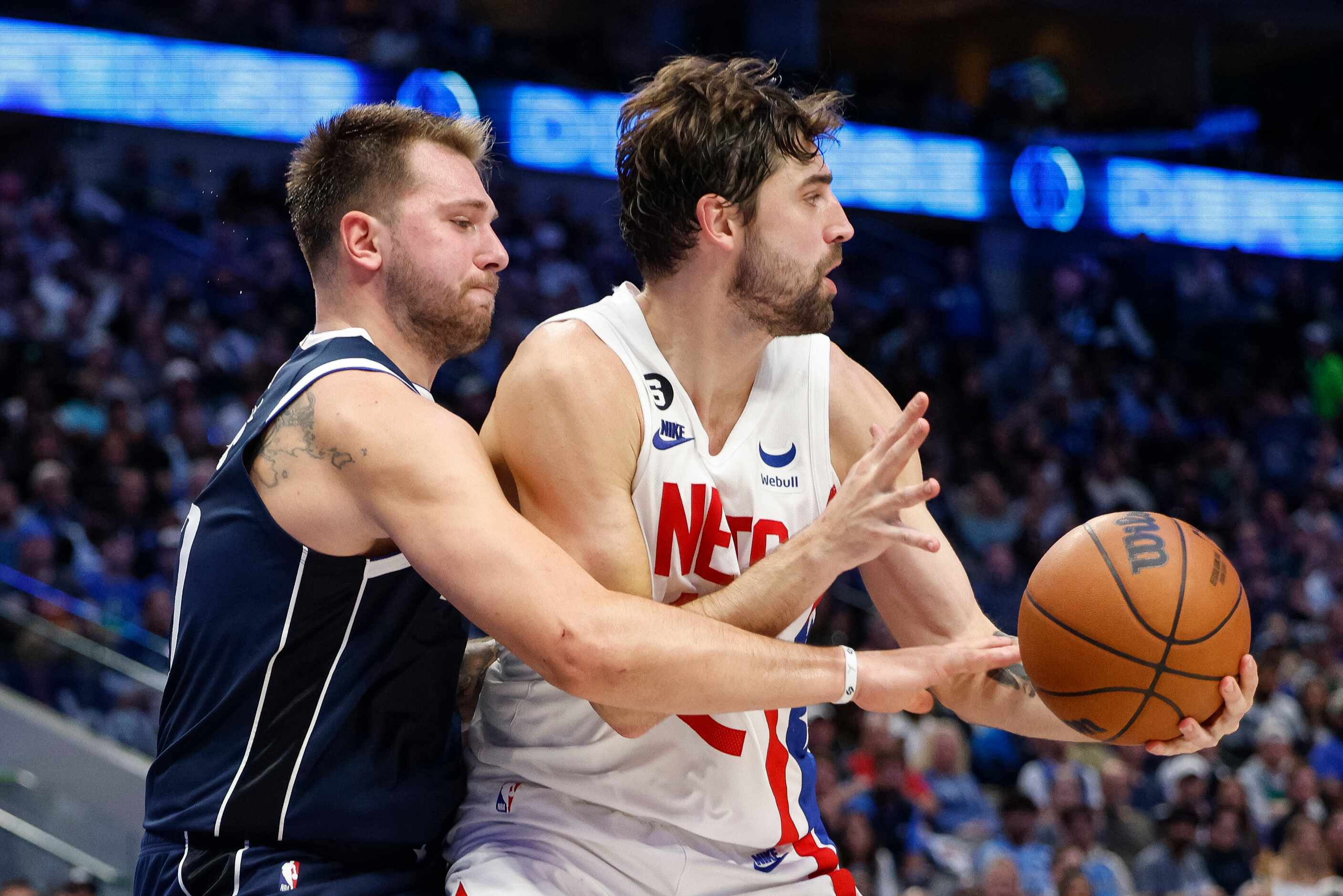 Dallas Mavericks guard Luka Doncic (77) defends against Brooklyn Nets forward Joe Harris...