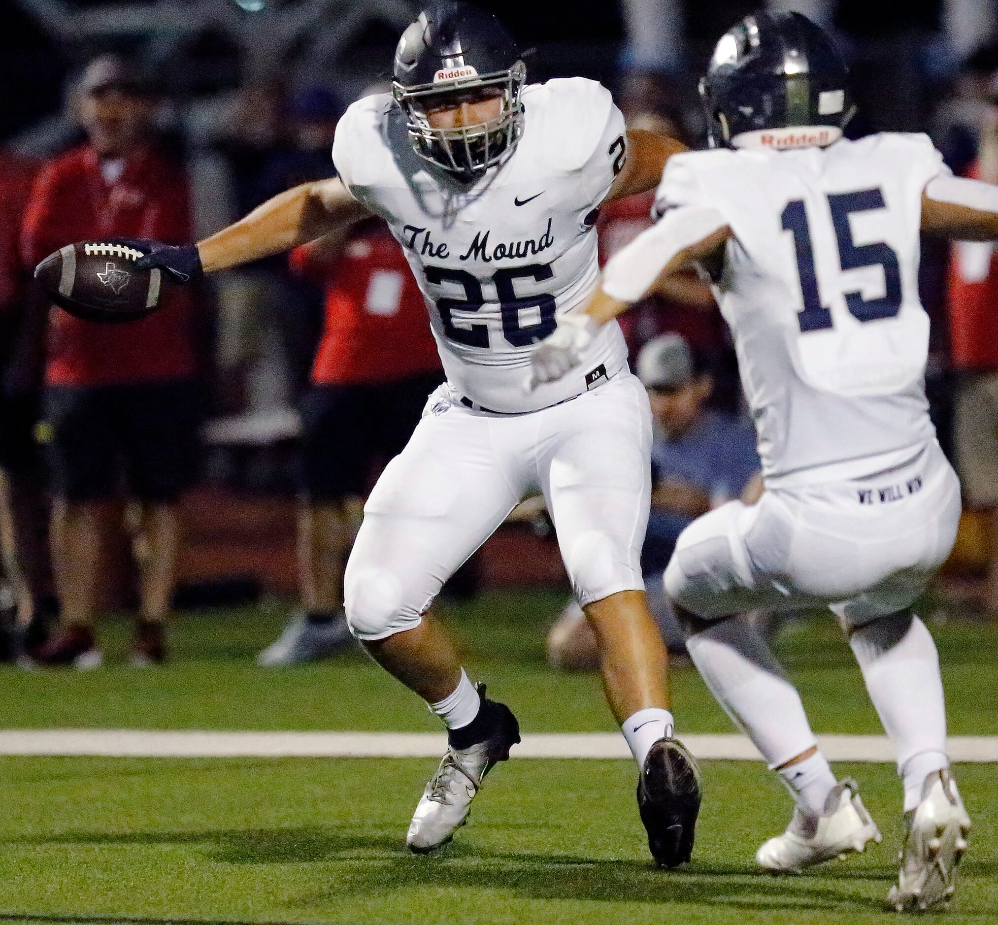 Flower Mound High School tight end Caden Jensen (26) celebrates his touchdown catch with...