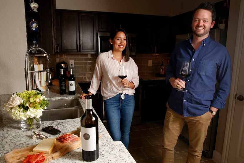 Michael Kennedy, founder of Component Wine Company, poses for a photograph with his wife...