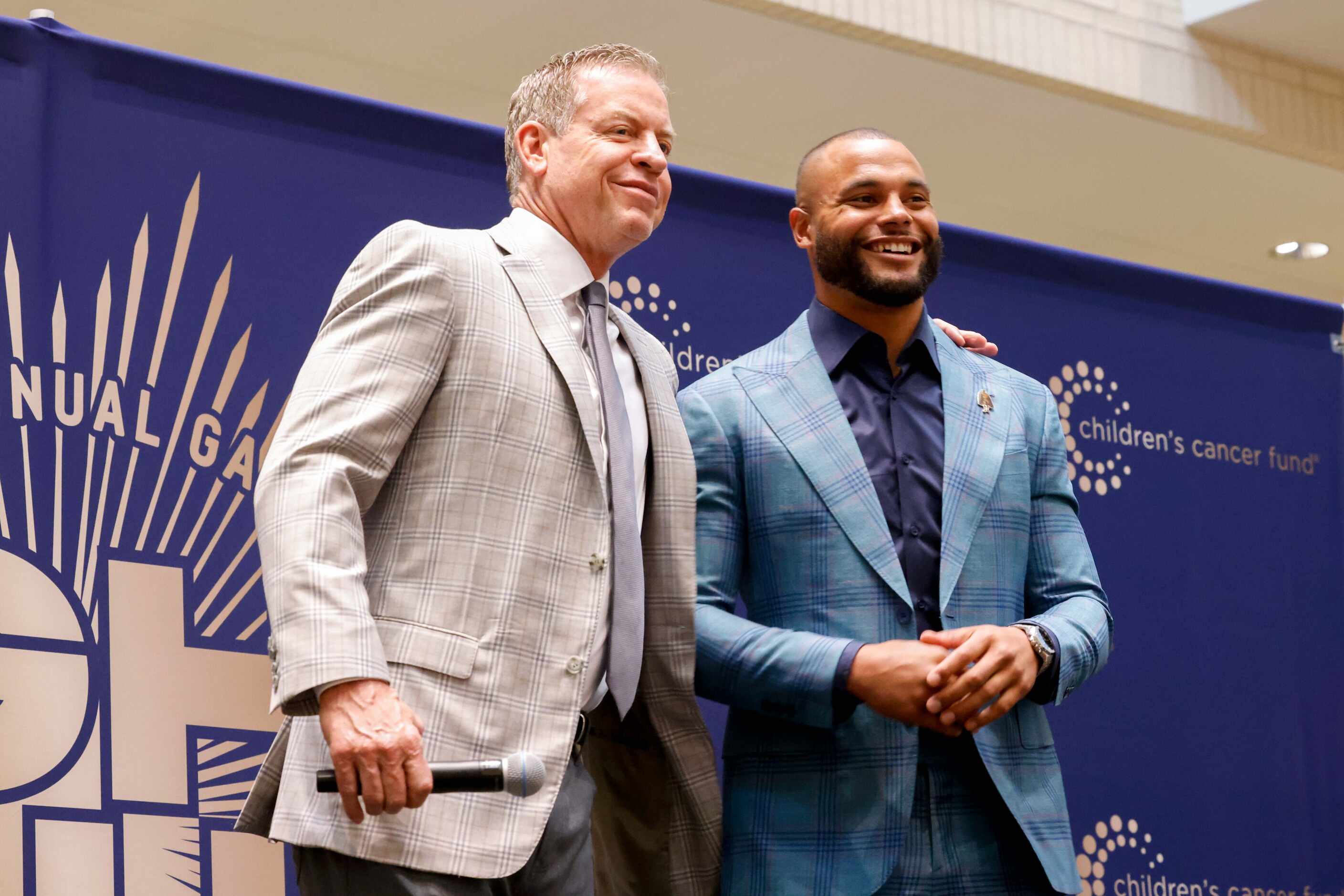 Dallas Cowboys Troy Aikman and Dak Prescott team up to introduce models for the upcoming...