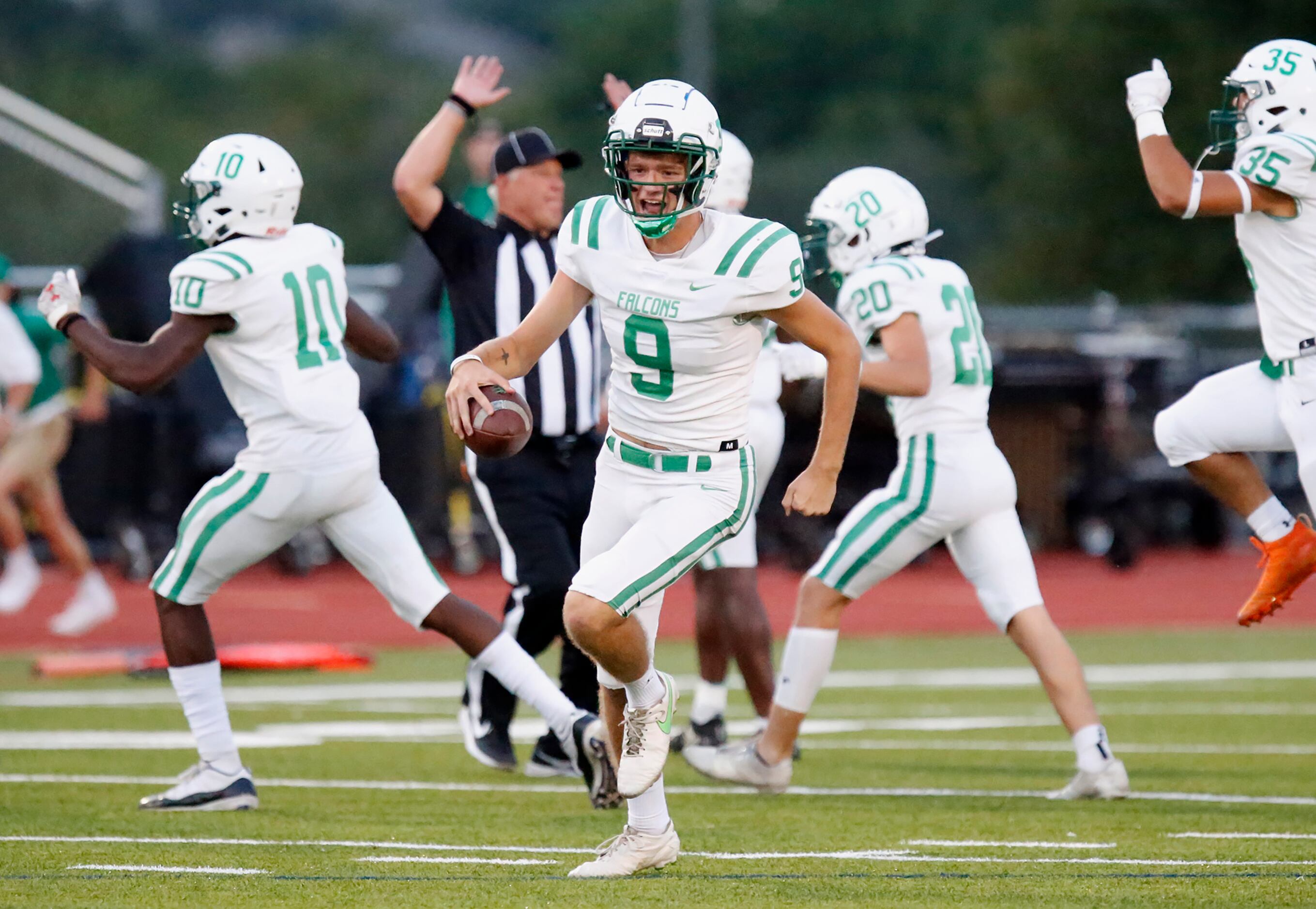 Lake Dallas High School kicker Preston Gregg (9) is jubilant after recovering his own onside...