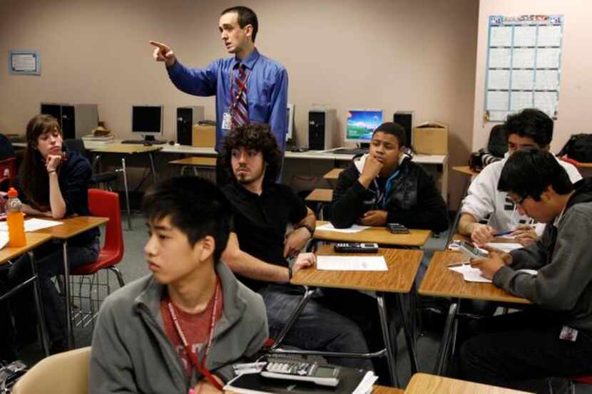 
DISD teacher Josh Newton teaches his AP Calculus AB class April 10 at Townview Magnet...