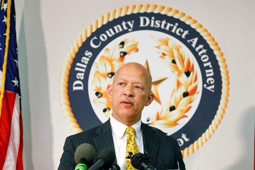 District Attorney John Creuzot held a press conference at the Frank Crowley Courthouse in...