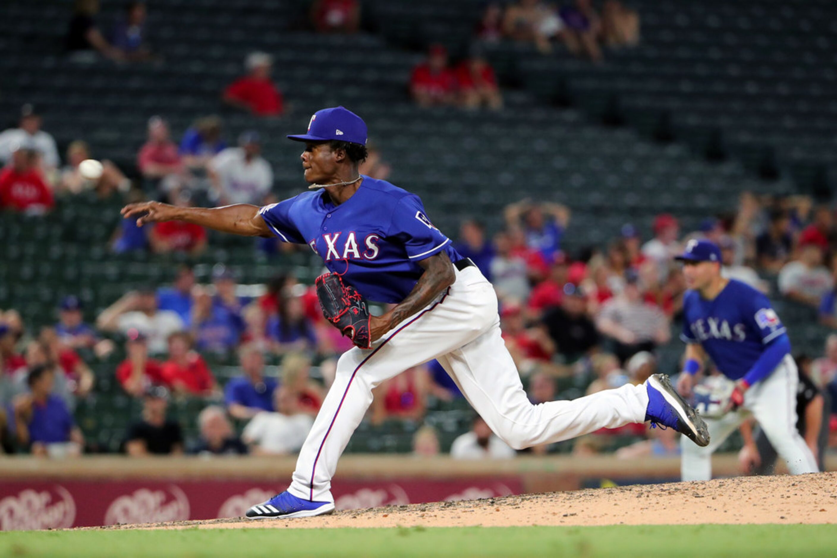 ARLINGTON, TEXAS - JULY 16: Phillips Valdez #67 of the Texas Rangers pitches against the...