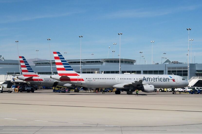 (FILES) In this file photo taken on February 15, 2017 American Airlines planes sit at the...