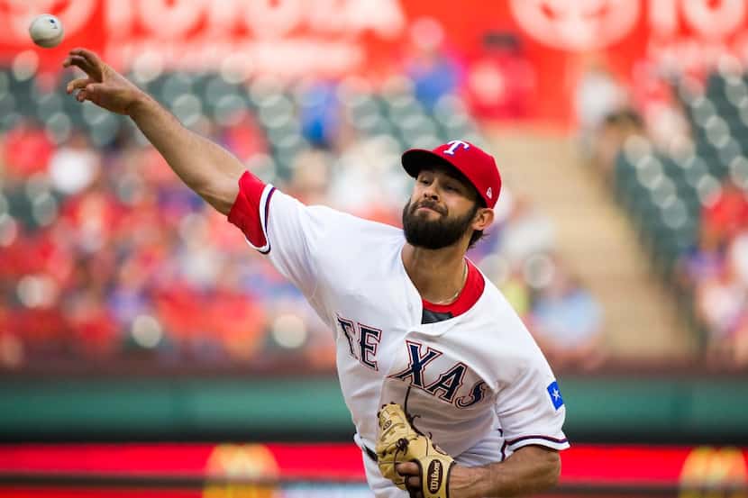 Texas Rangers starting pitcher Nick Martinez pitches during the first inning against the...