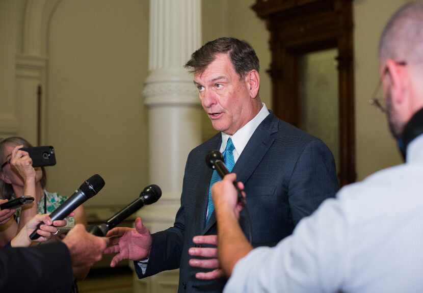 Dallas Mayor Mike Rawlings speaks with reporters after meeting with Gov. Greg Abbott to...