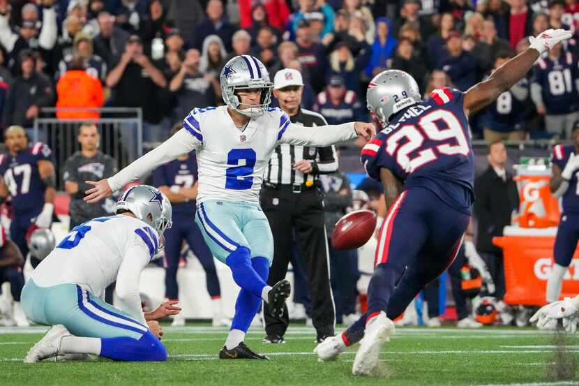 Dallas Cowboys kicker Greg Zuerlein (2) kicks a 49-yard field goal from the hold of punter...
