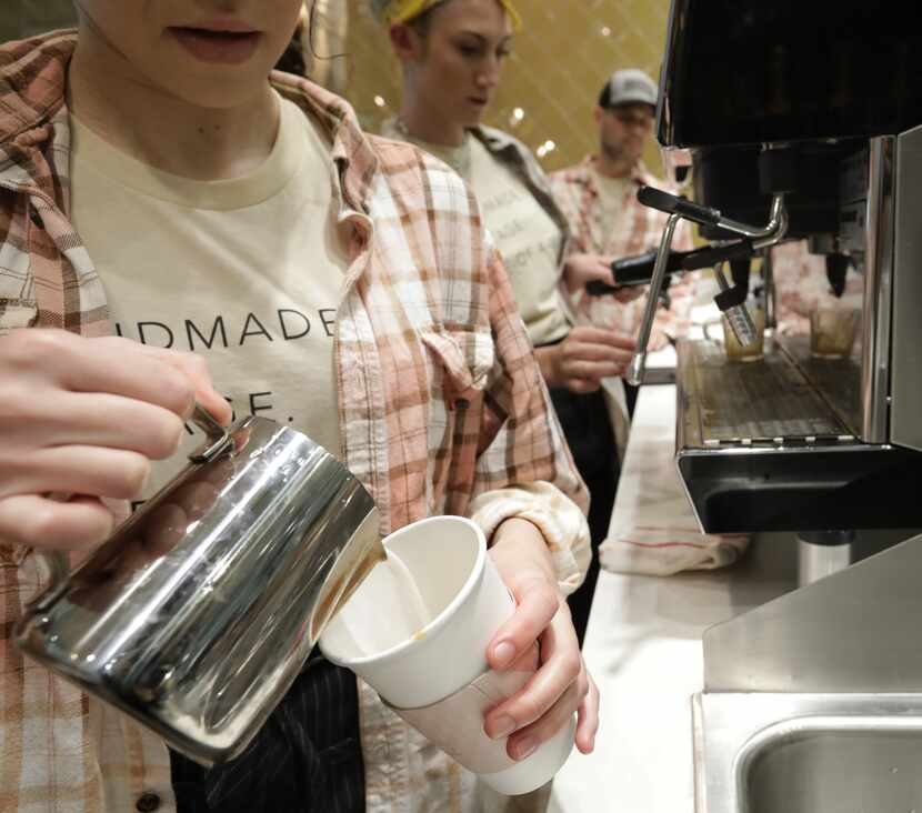 Jacqueline Blanco makes a latte at Heirloom Haul, the new restaurant inside Flea Style, at...
