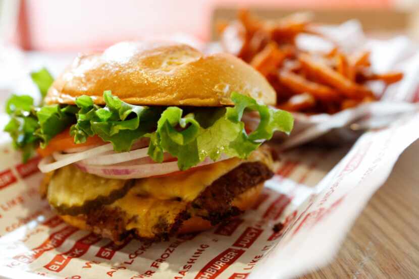 A Classic Smashburger with a side of Sweet Potato Smashfries at the Mockingbird Station...