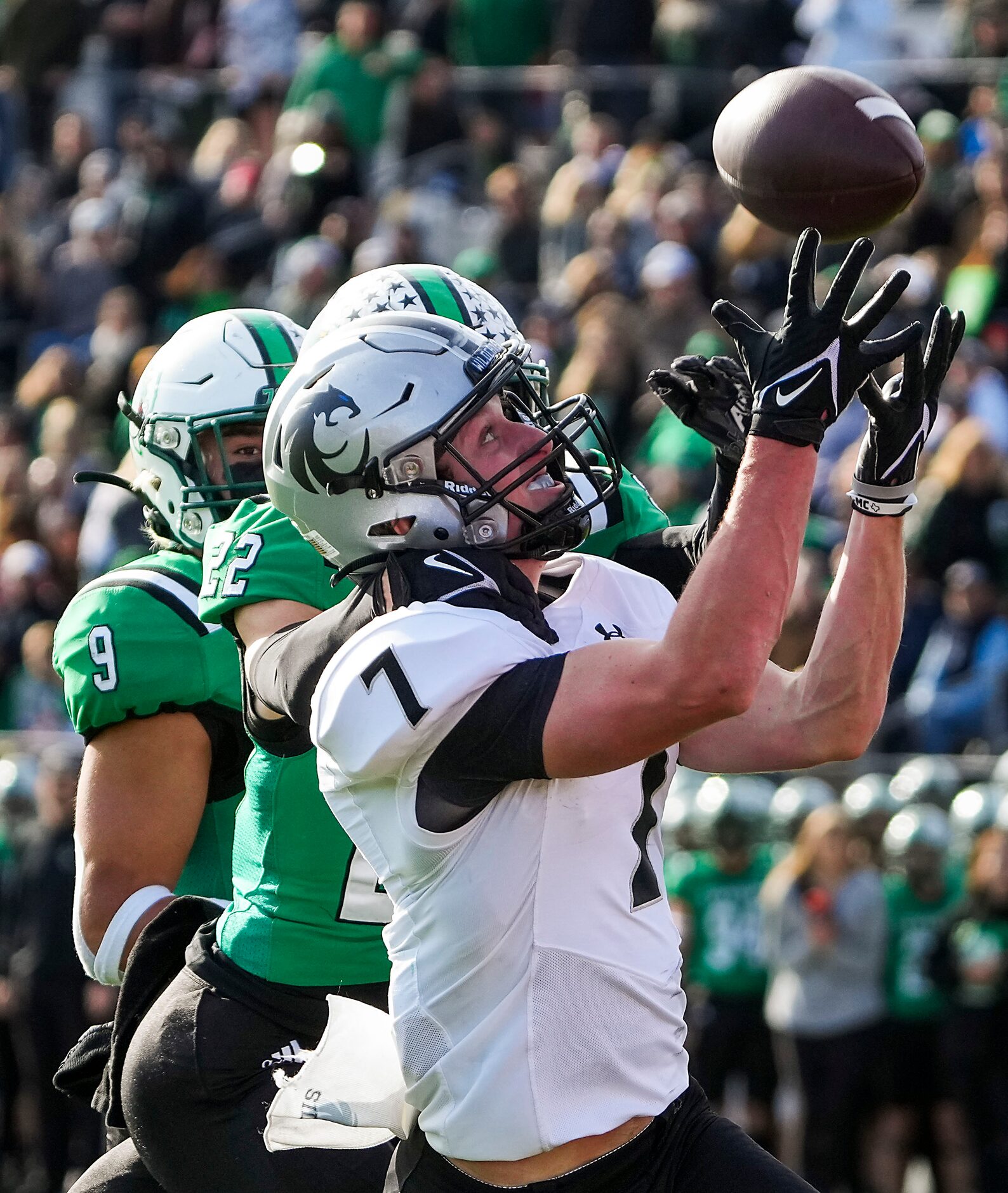 Denton Guyer wide receiver Landon Sides (7) hauls in a 38-yard touchdown pass from...