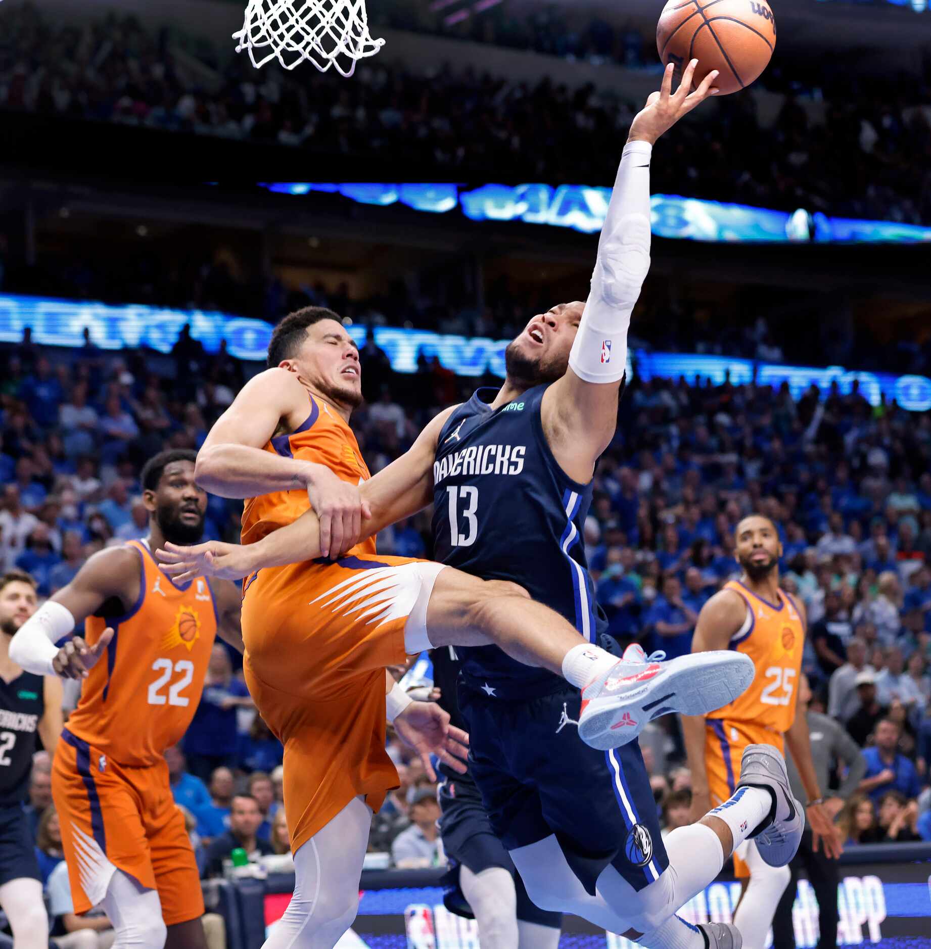 Dallas Mavericks guard Jalen Brunson (13) is fouled as he tries to put up a shot against...