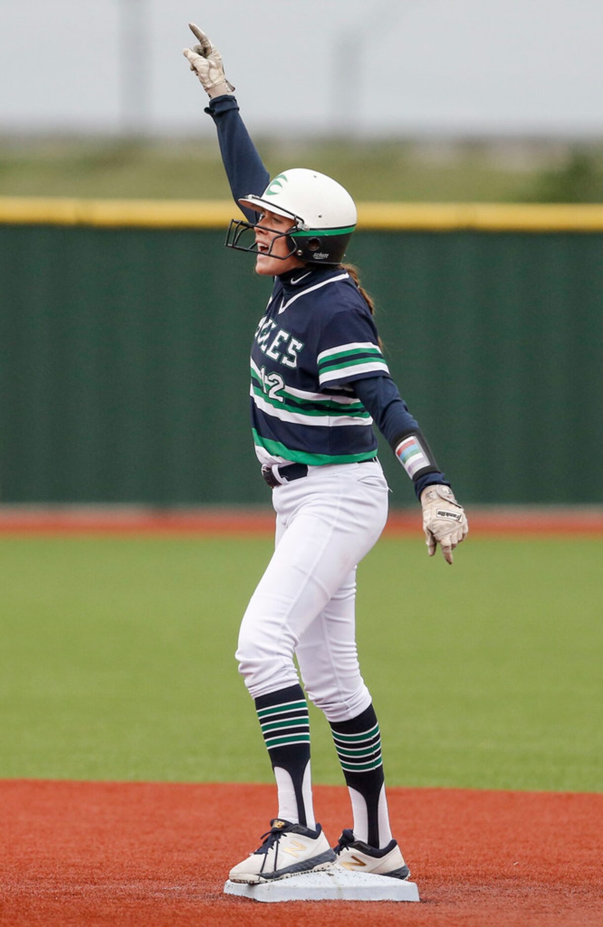 EatonÃs Ashlyn Walker celebrates a double during the first inning of a one-game Class 6A...