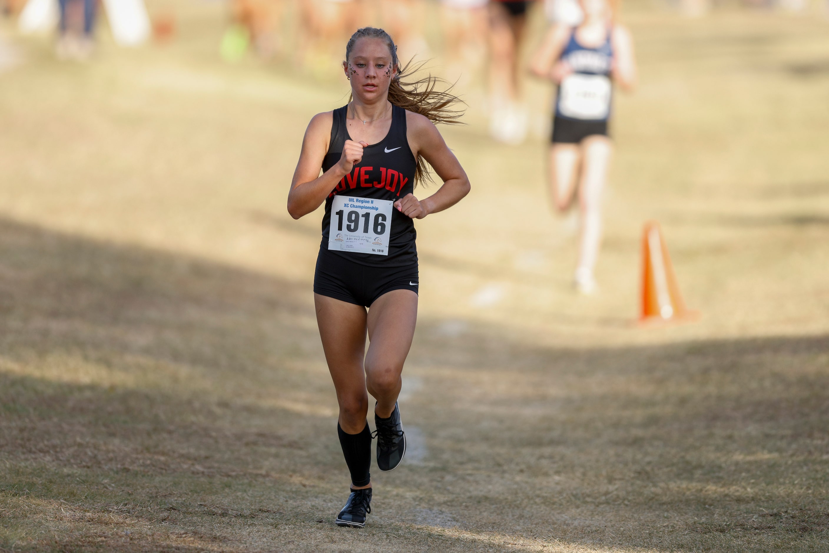 Lucas Lovejoy’s Camryn Benson leads the field during the UIL Class 5A Region II cross...