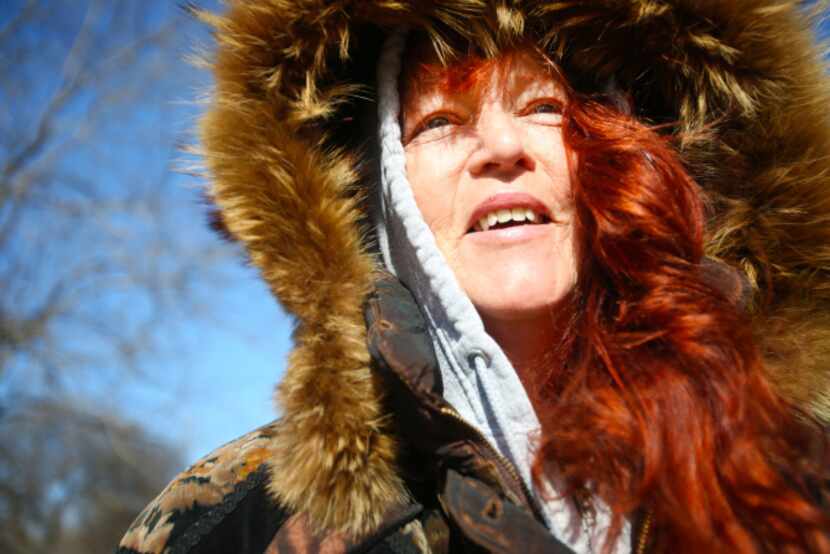 Kate Mullen watched her dog play at the White Rock Lake dog park as the cold front moved in...