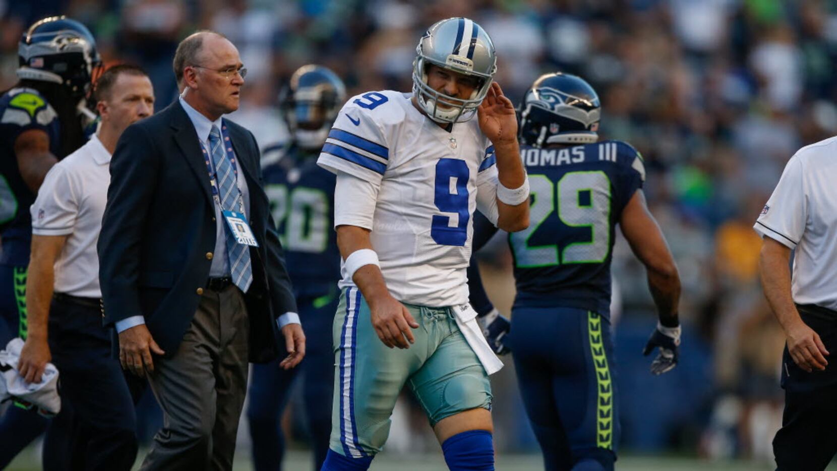 SEATTLE, WA - AUGUST 25:  Quarterback Tony Romo #9 of the Dallas Cowboys leaves the field...