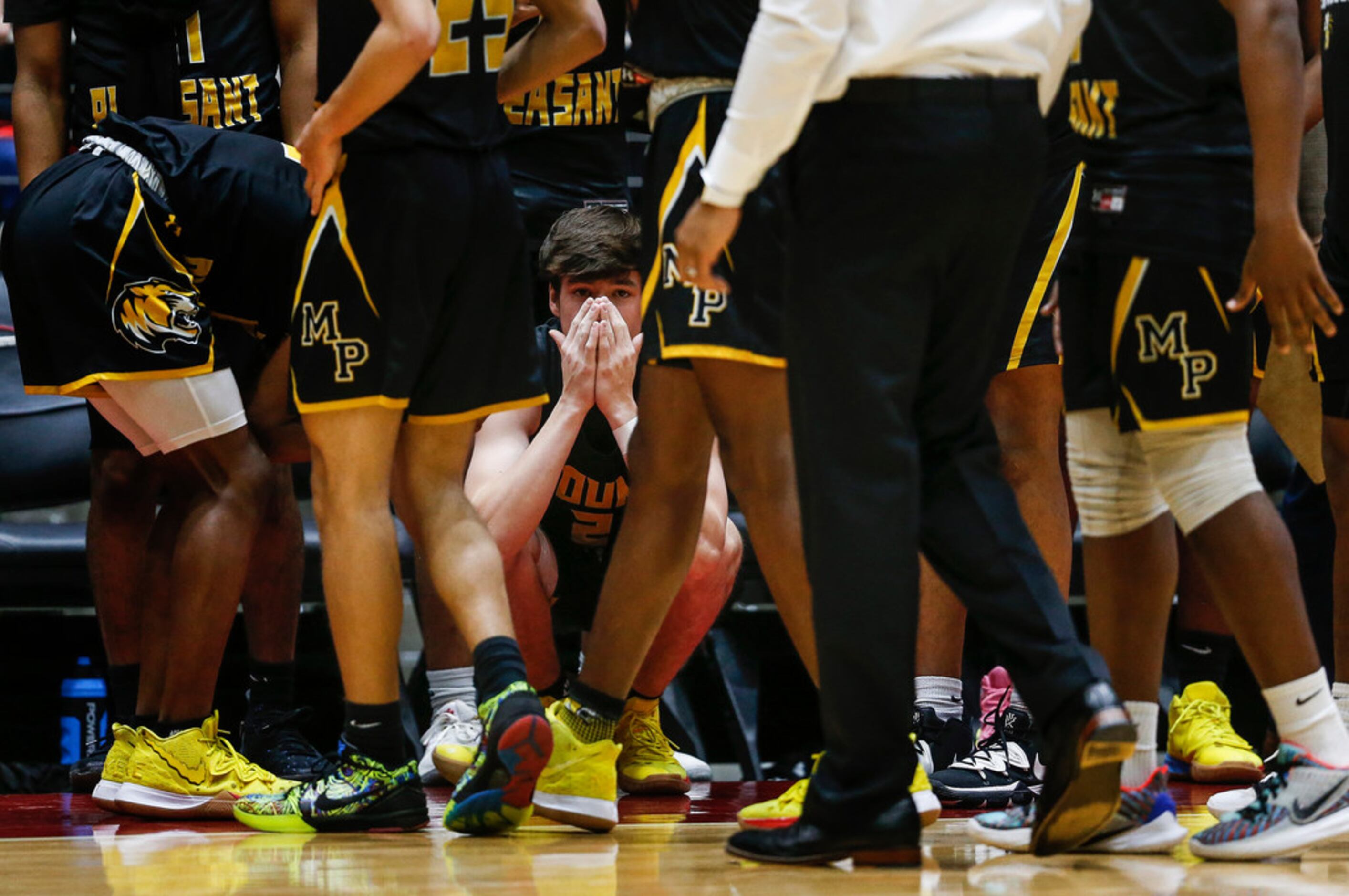 Mount Pleasant's Brock Cooper (2) reacts after a loss to Kimball in a boys basketball UIL...