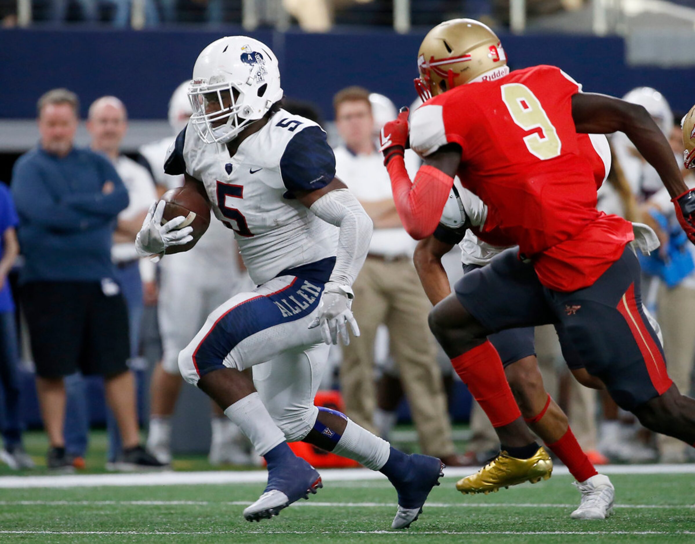 Allen's Brock Sturges (5) is chased by South Grand Prairie's Atanza Vongor (9) during the...