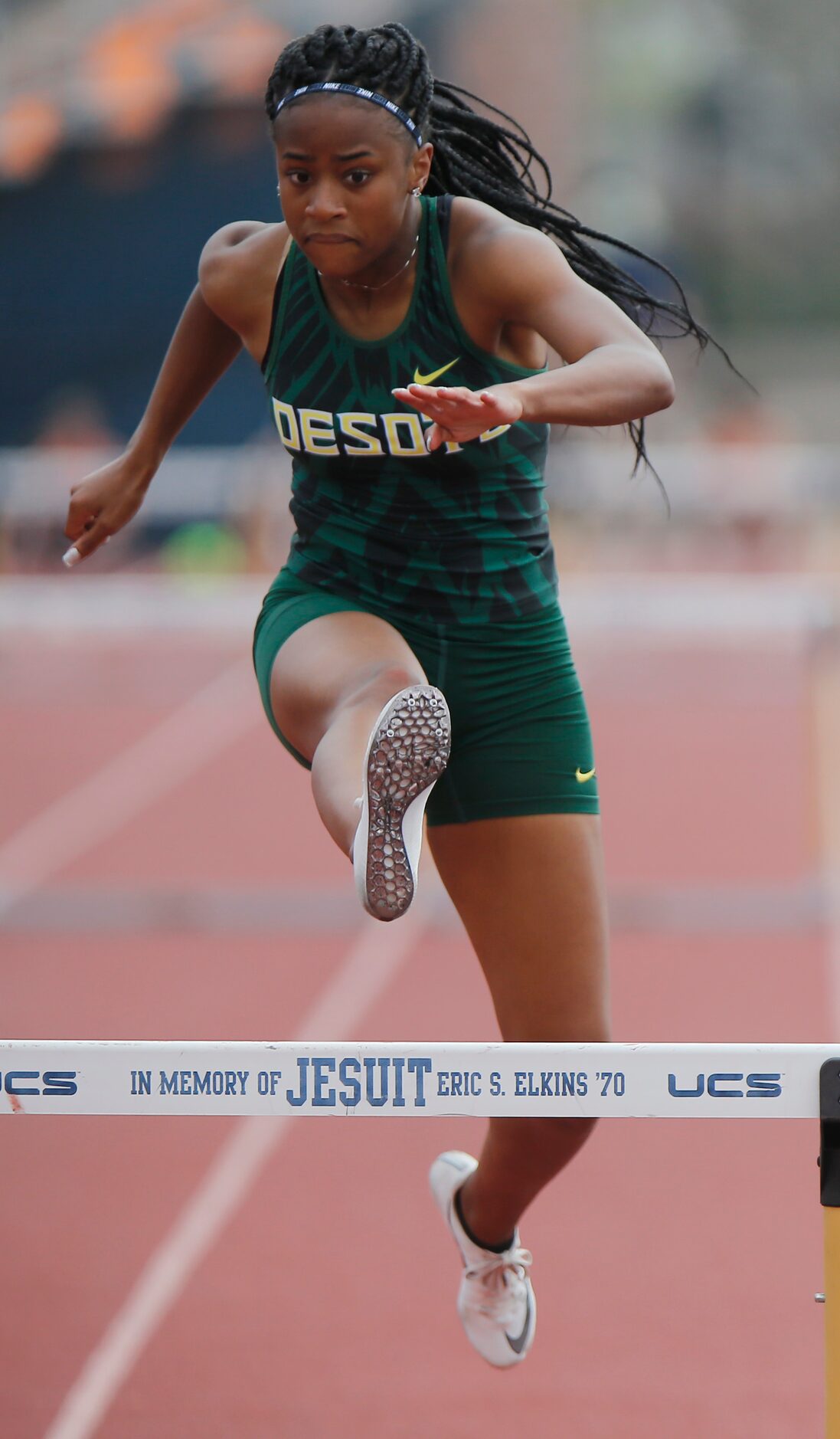 Jalaysi’Ya Smith, 17, of DeSotto High School, finished first in the third heat of the girls...