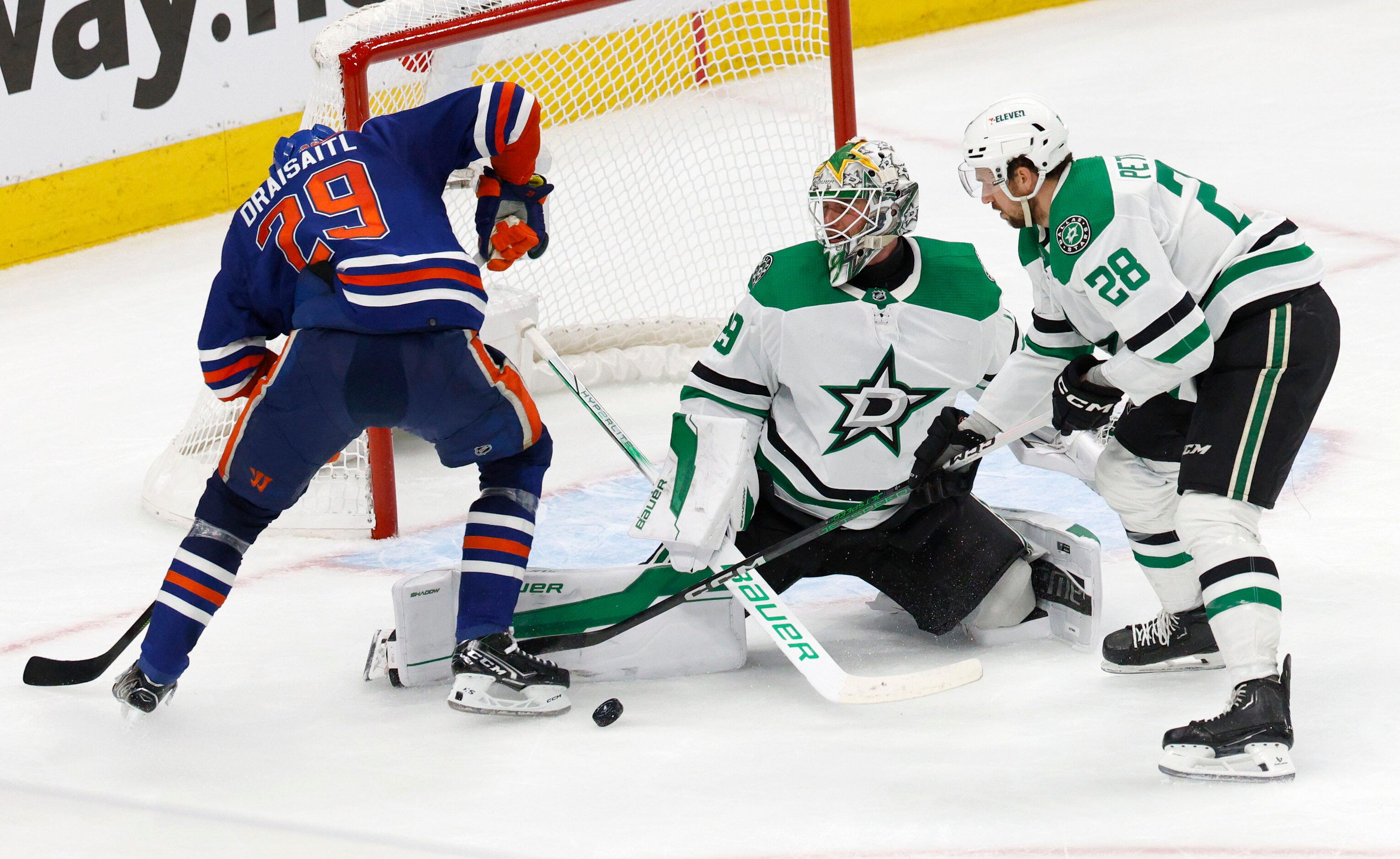 Edmonton Oilers center Leon Draisaitl (29) and Dallas Stars defenseman Alexander Petrovic...