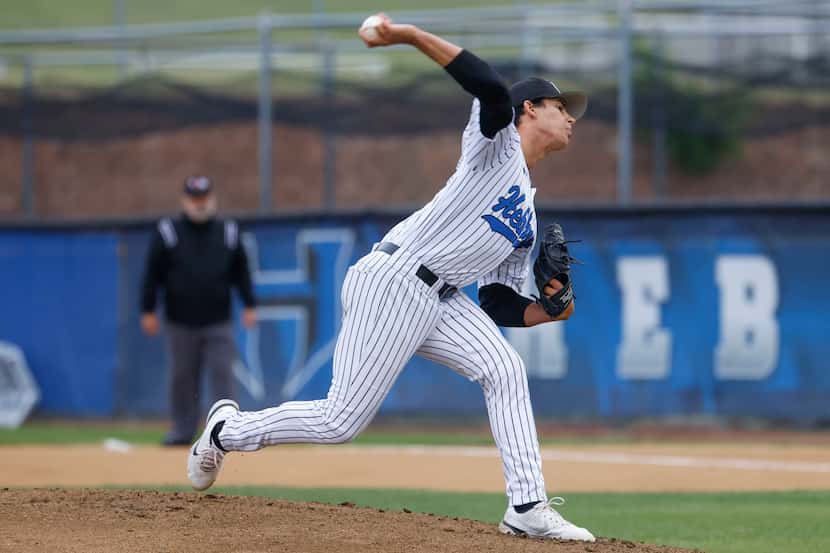 Hebron High’s pitcher Marcos Paz throws a pitch during the first inning of a baseball game...
