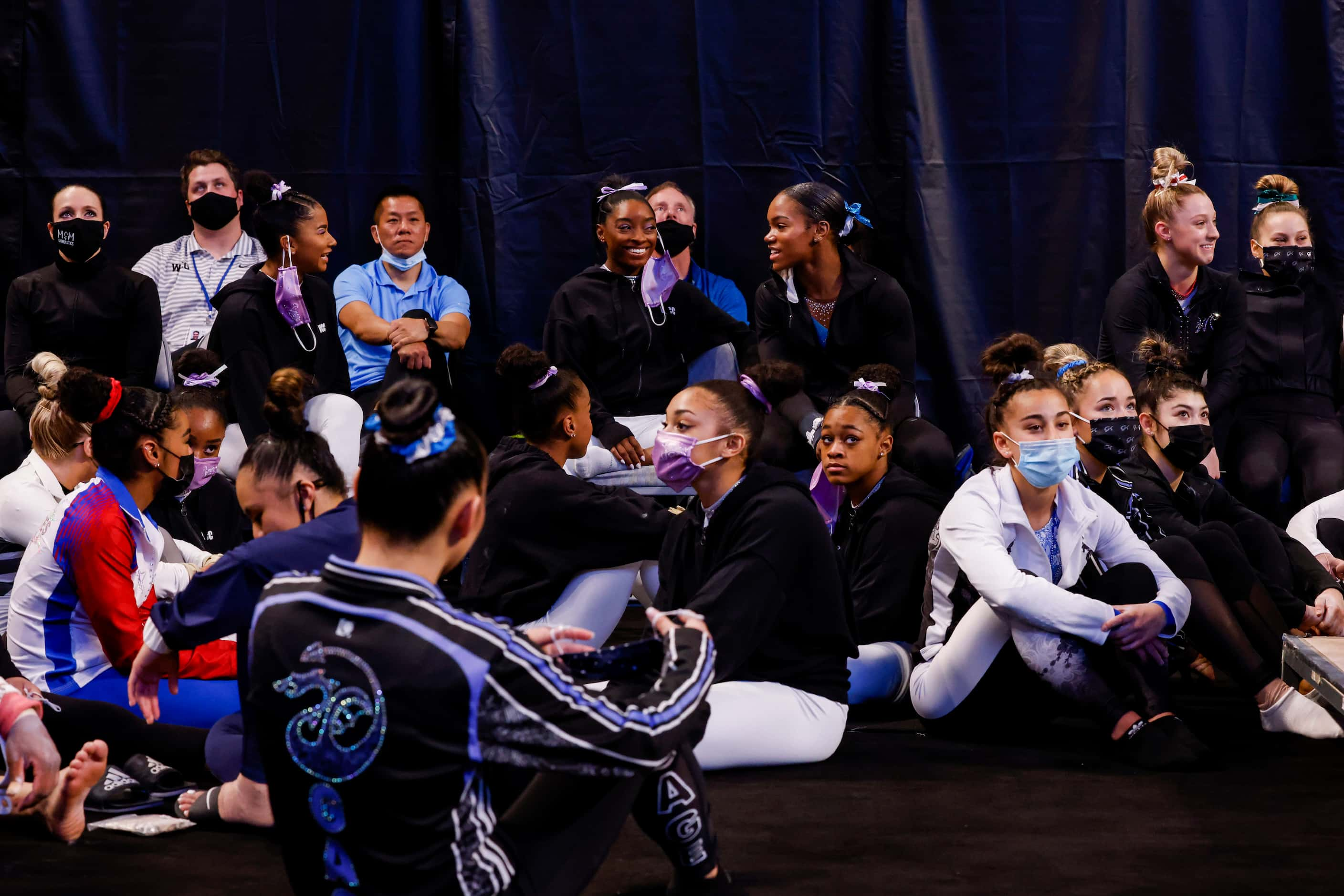 Gymnasts wait for the start of day 1 of the senior women's US gymnastics championships on...